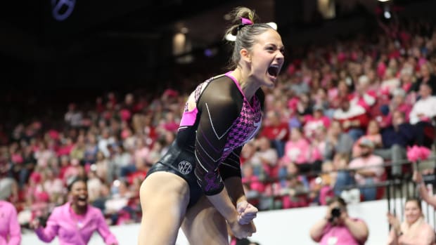 Gabby Gladieux on floor in Power of Pink meet